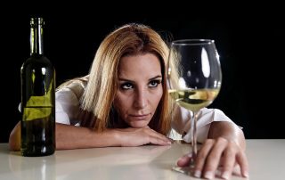 woman suffering from alcohol dependence
