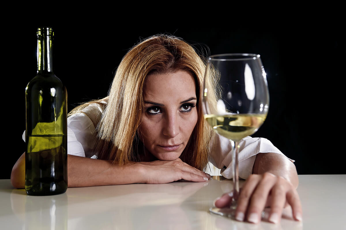 woman suffering from alcohol dependence