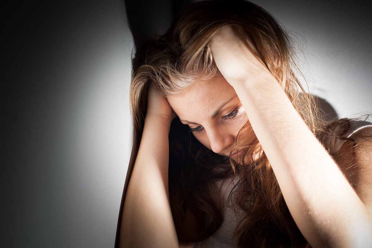 woman experiencing detox symptoms