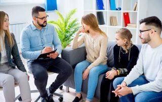 family at a family therapy program