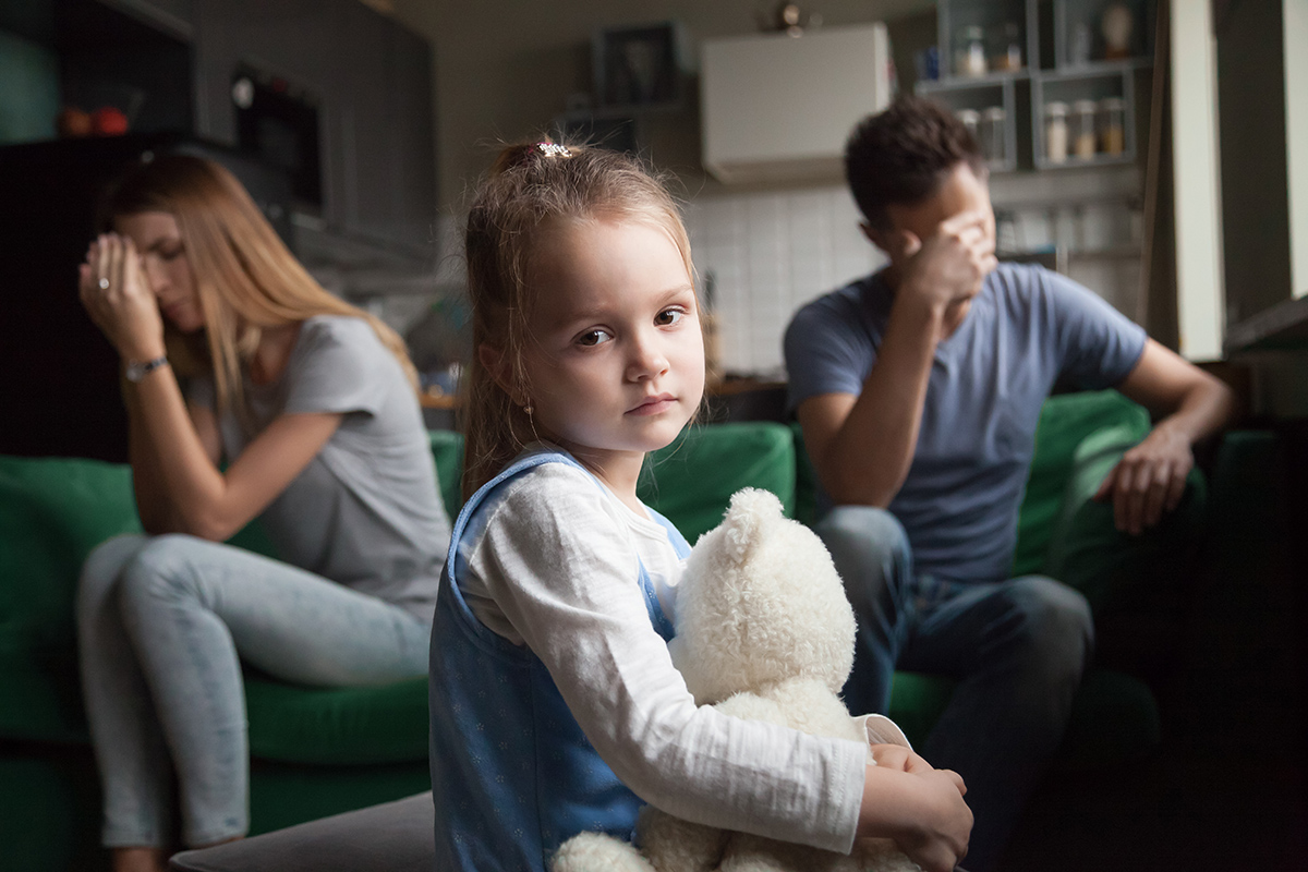 Child turning around because she doesn't understand addiction toll on families