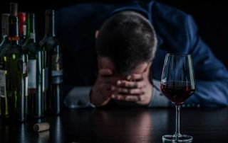 man who is showing the effects of alcohol