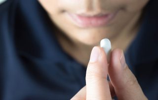 a woman struggles with an addiction to prescription drugs