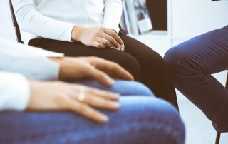 a group learns about cognitive-behavioral therapy