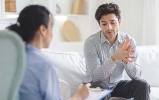 a man learns about opioid addiction treatment