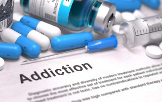 a bottle of pills and medication represents a need for an opiate addiction treatment center