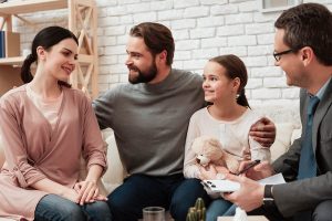parents with daughter in family therapy - addiction treatment therapies CONCEPT IMAGE