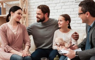 parents with daughter in family therapy
