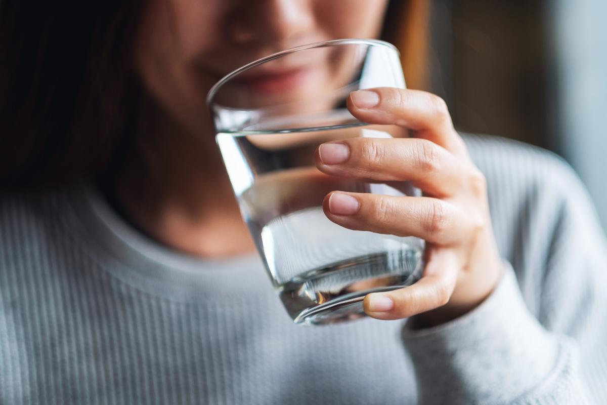 woman drinking water in medical detox - medically assisted detox in Atlanta GA