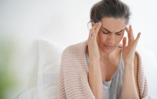 woman with headache - what to expect from benzo detox