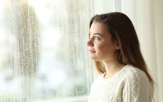 person-looking-out-the-window-while-thinking-what-is-dbt