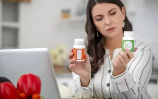 woman comparing opioid detox vitamins