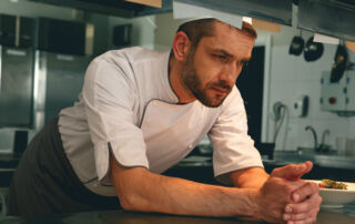 tired chef working long hours - jobs with most substance abuse