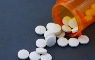 Prescription bottle with pills