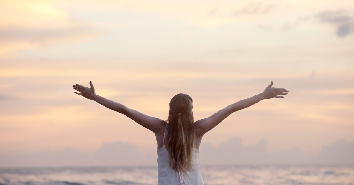 A woman enjoying the pretty sky