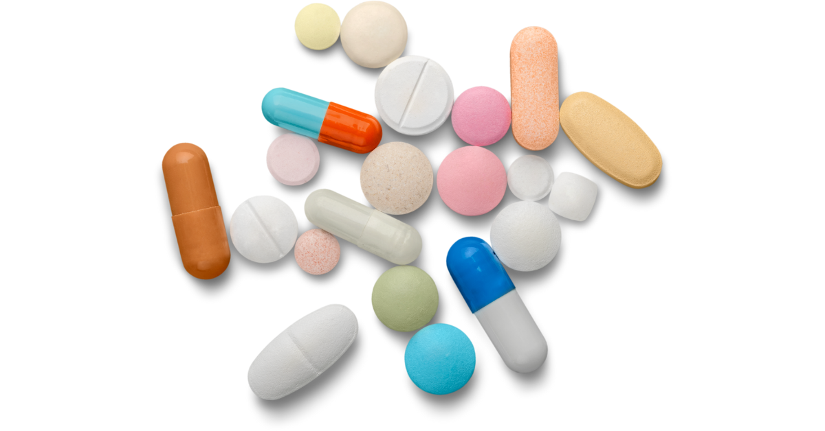 Colorful pills on a white background