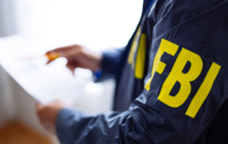FBI agent wearing an FBI jacket